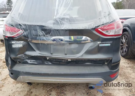 2016 Ford Escape Titanium z USA, uszkodzony, nr VIN 1FMCU0J92GUB43545